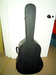 The newly-blackened guitar case. It's gouache, folks!
